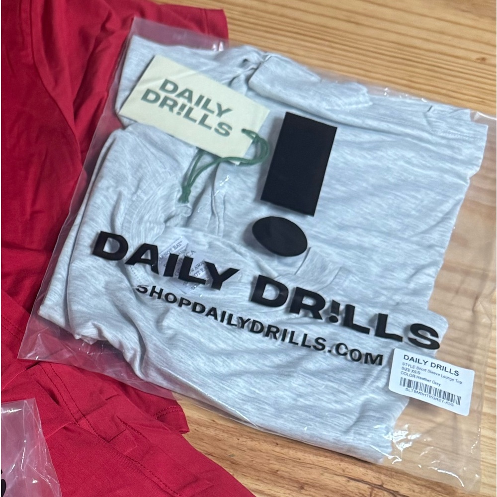 Daily Drills valentines drop grey top
